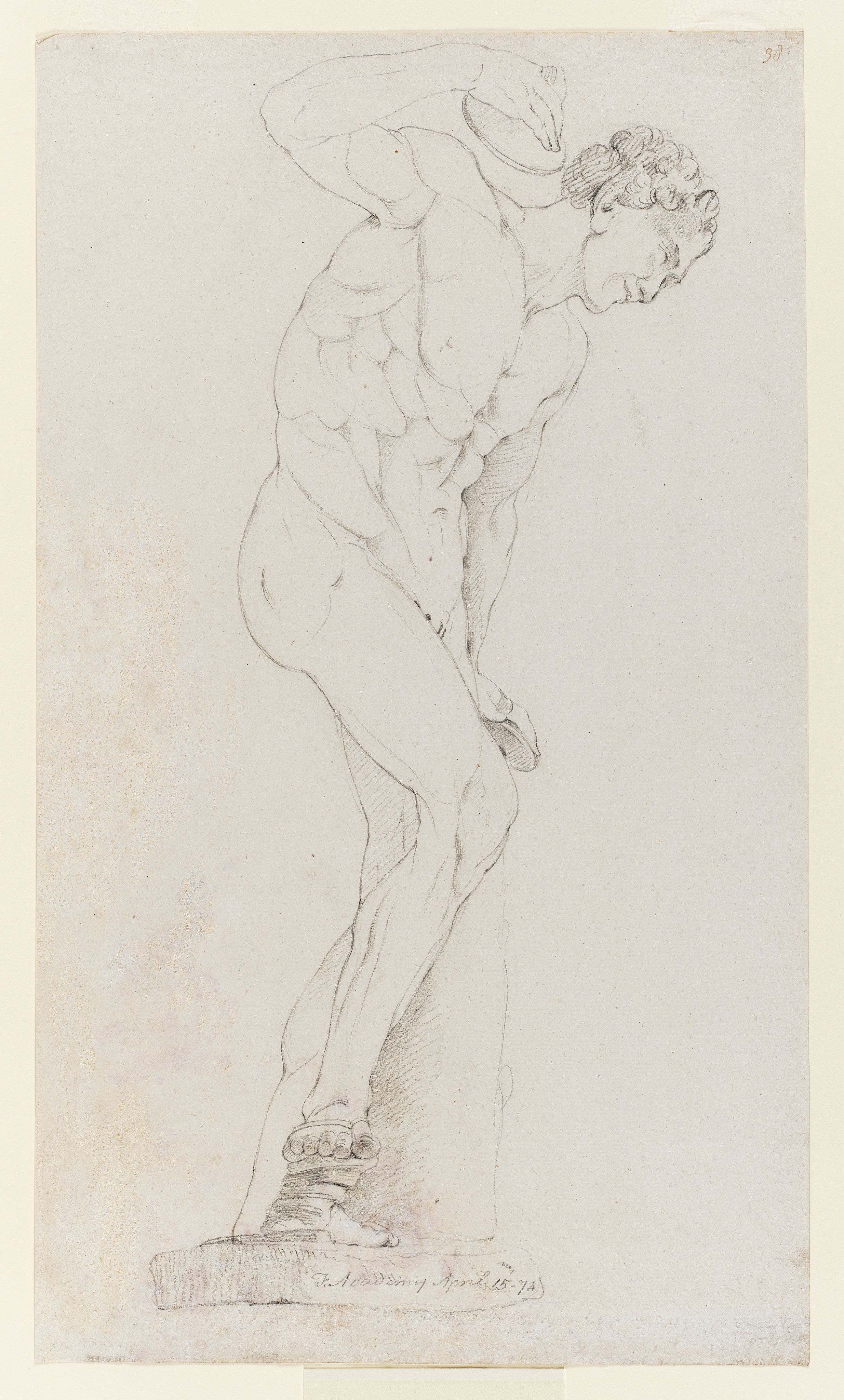 Drawing of a nude male figure, dancing, identified as a study of the 'Dancing Faun (or Satyr)', after a cast from the Antique sculpture at the Uffizi Gallery, Florence.The figure is seen in profile, and faces right. He plays cymbals and his right foot oprates a croupezion (footclapper). Inscribed on recto, along pedestal edge (handwritten in pencil): 'F. Academy April 15 - 74' and to upper right (handwritten in ink): '38'. Made by Joseph Wright of Derby (1734-1797), 1774. Pencil on paper. Displayed in a cream window mount.