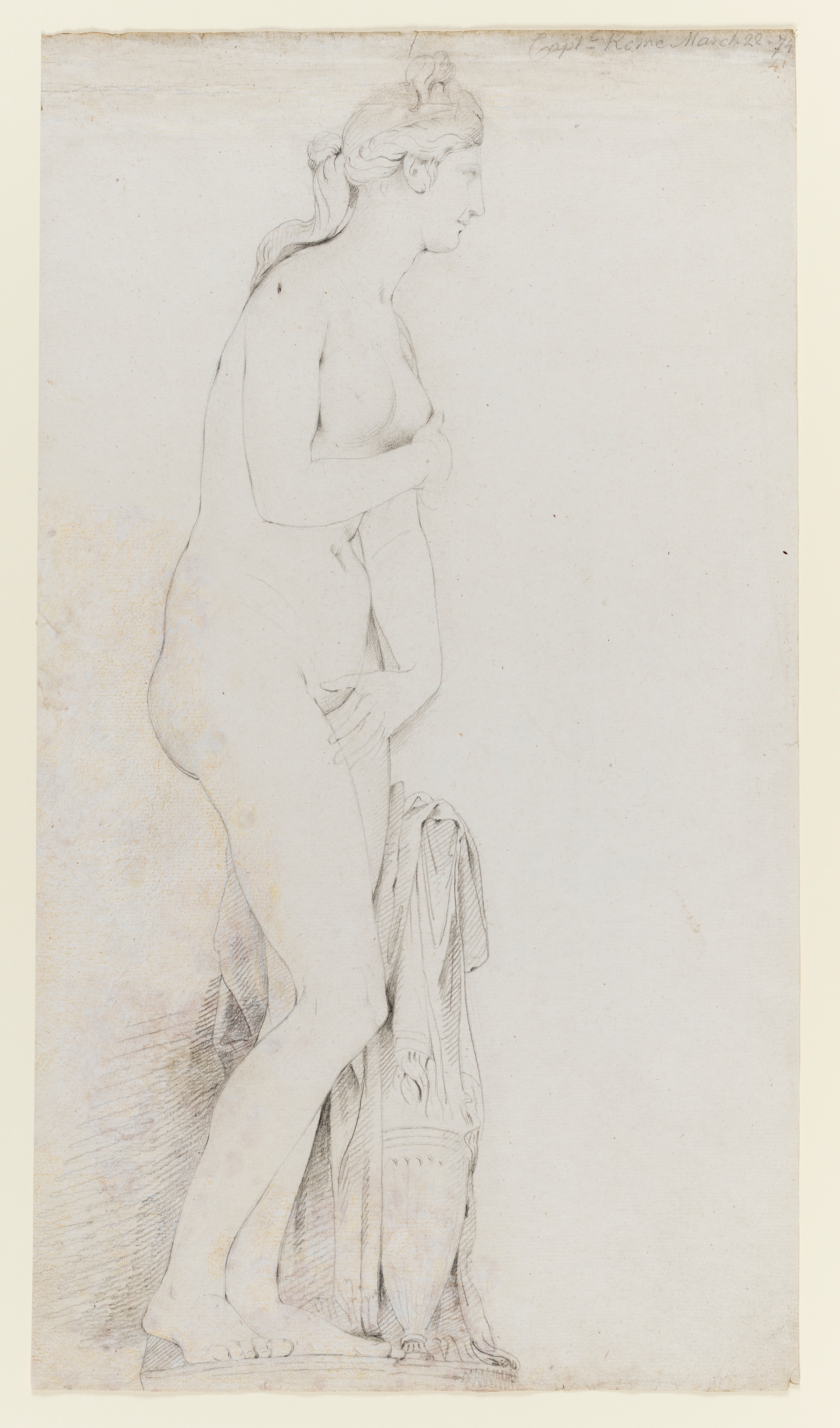 Drawing of a nude female figure, standing, identified as a study of the Roman sculpture of Venus in the Capitoline Museums in Rome. The view is a full length, in profile, facing right. She stands beside a decorative urn, upon which is draped a cloth. Inscribed on recto, to upper right (handwritten in pencil): 'Capl - Rome March 22 - 74' and below that (handwritten in ink): '41'. Made by Joseph Wright of Derby (1734 - 1797), 1774. Pencil and charcoal on laid paper. Displayed in a cream window mount.