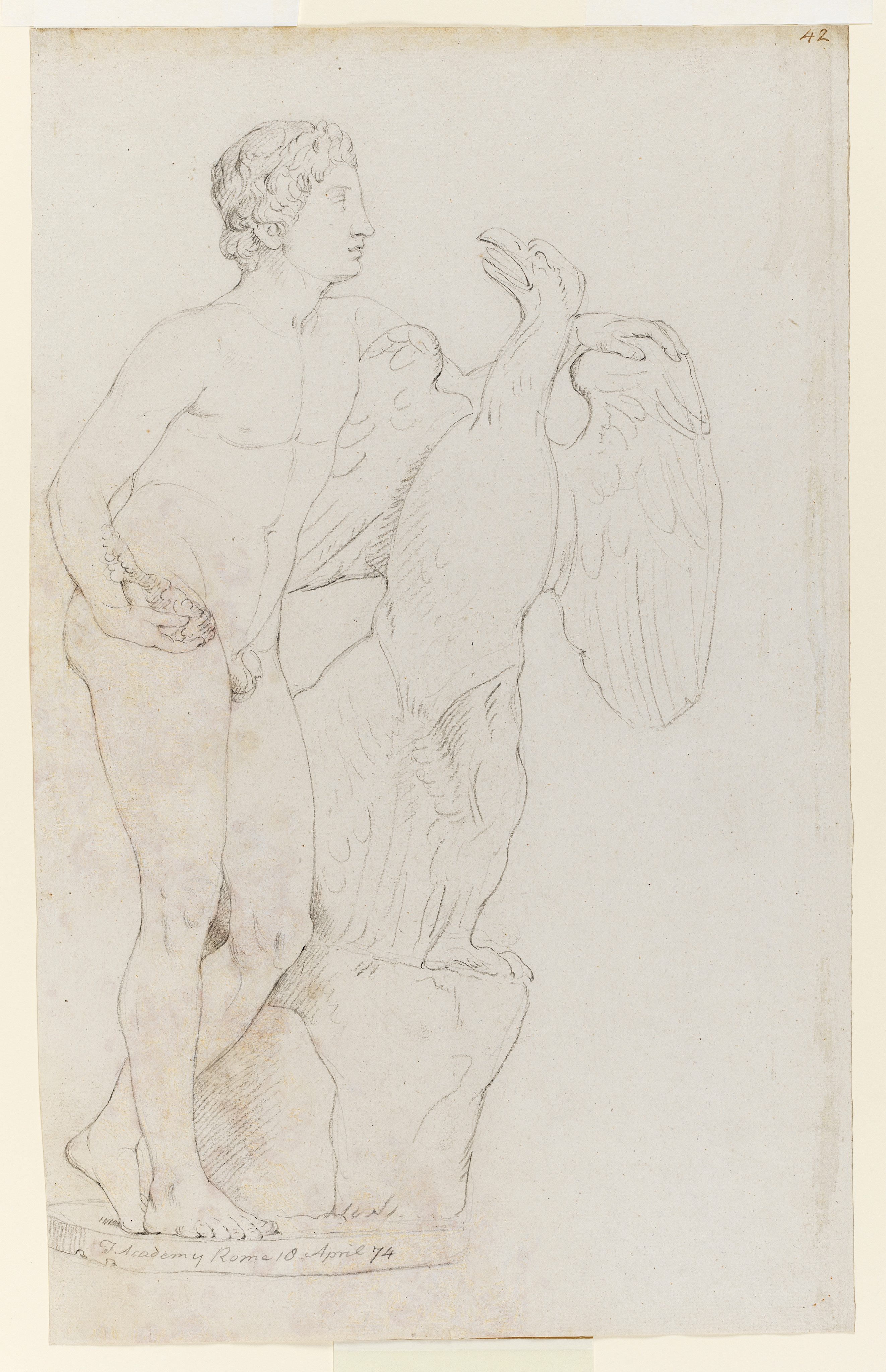 Drawing of a nude male figure with an eagle, identified as a study of a cast of a Roman sculpture known as 'Ganymede with the Eagle', in The Uffizi, Florence. The view is of the figure in profile, facing right. Inscribed on recto, along pedestal edge (handwritten in pencil): 'F Academy Rome 18 April 74' and to upper right (handwritten in ink): '42'. Made by Joseph Wright of Derby (1734 - 1797), 1774. Pencil and charcoal on laid paper. Displayed in a cream window mount.