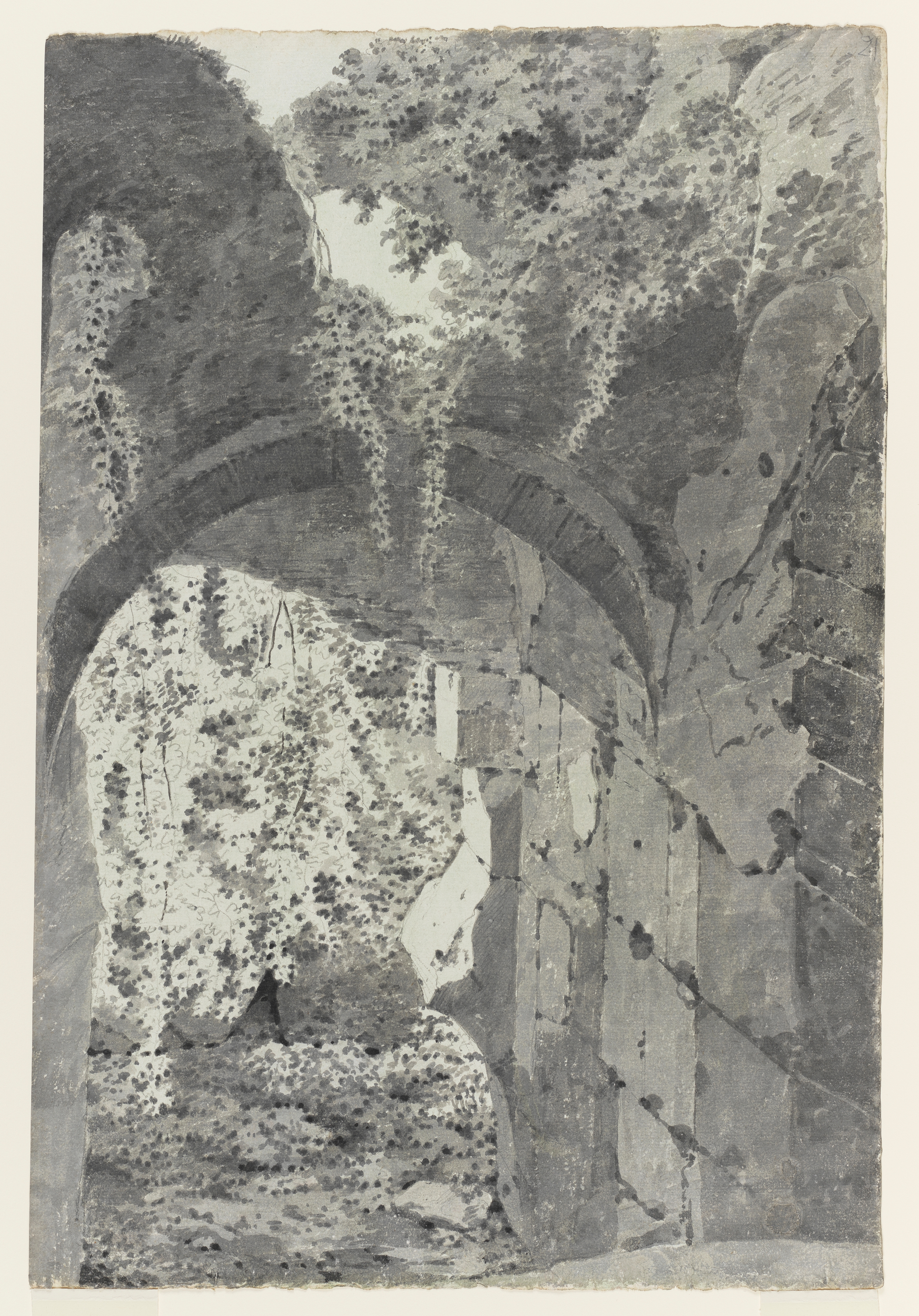 Drawing of a settlement with a view of a villa behind a wall, cypress trees and umbrella pines beyond. Inscribed on recto, to top right (handwritten in pencil): '19'. A piece of the sheet has been cut from the top left corner and repaired. Made by Joseph Wright of Derby (1734 - 1797), 1773-1775. Pencil on paper. Displayed in a cream window mount.