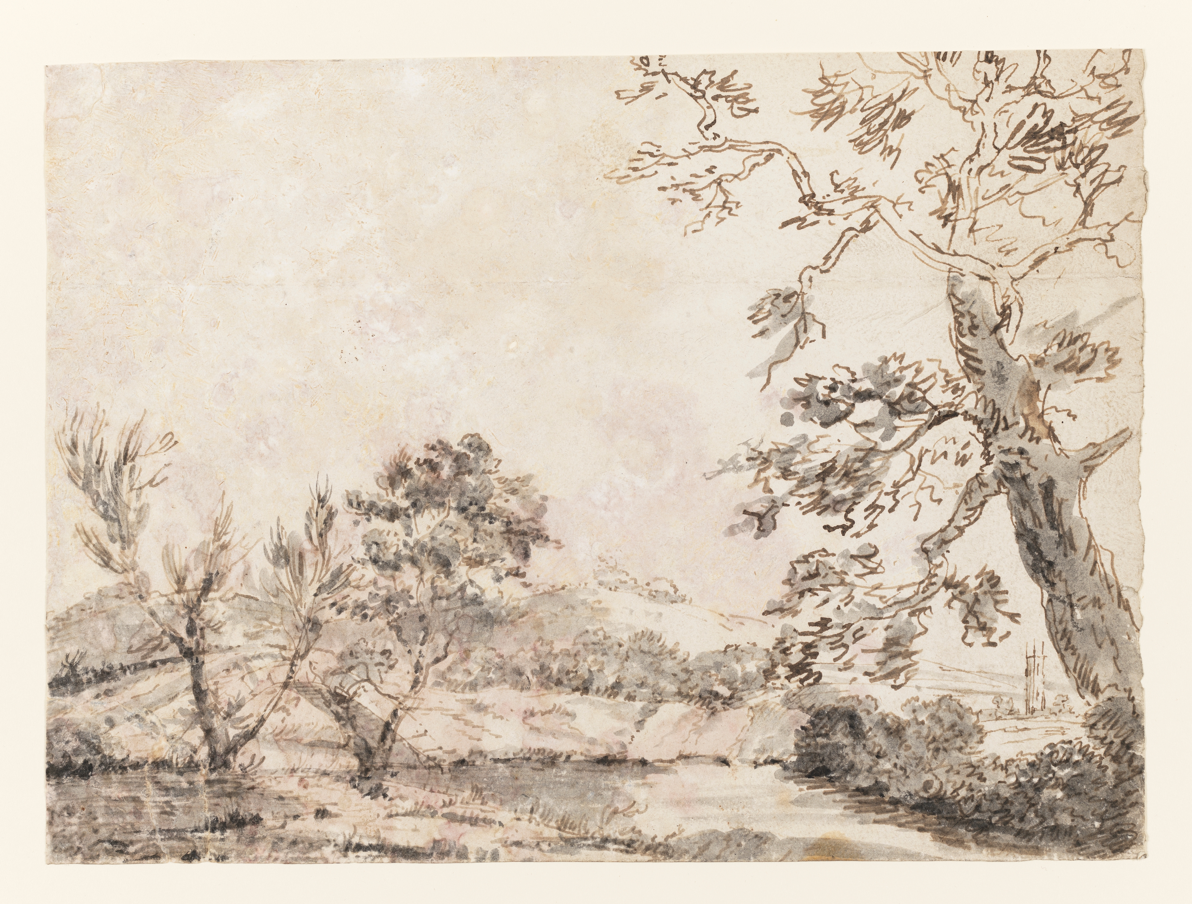 Drawing of a landscape with a lake or river, hills to the left, and a rock and trees to the right. Identified as an invented landscape based on an earlier, rough sketch. Made by Joseph Wright of Derby (1734 - 1797), c.1770. Black ink and sepia ink washes on laid paper. Displayed in a cream window mount.