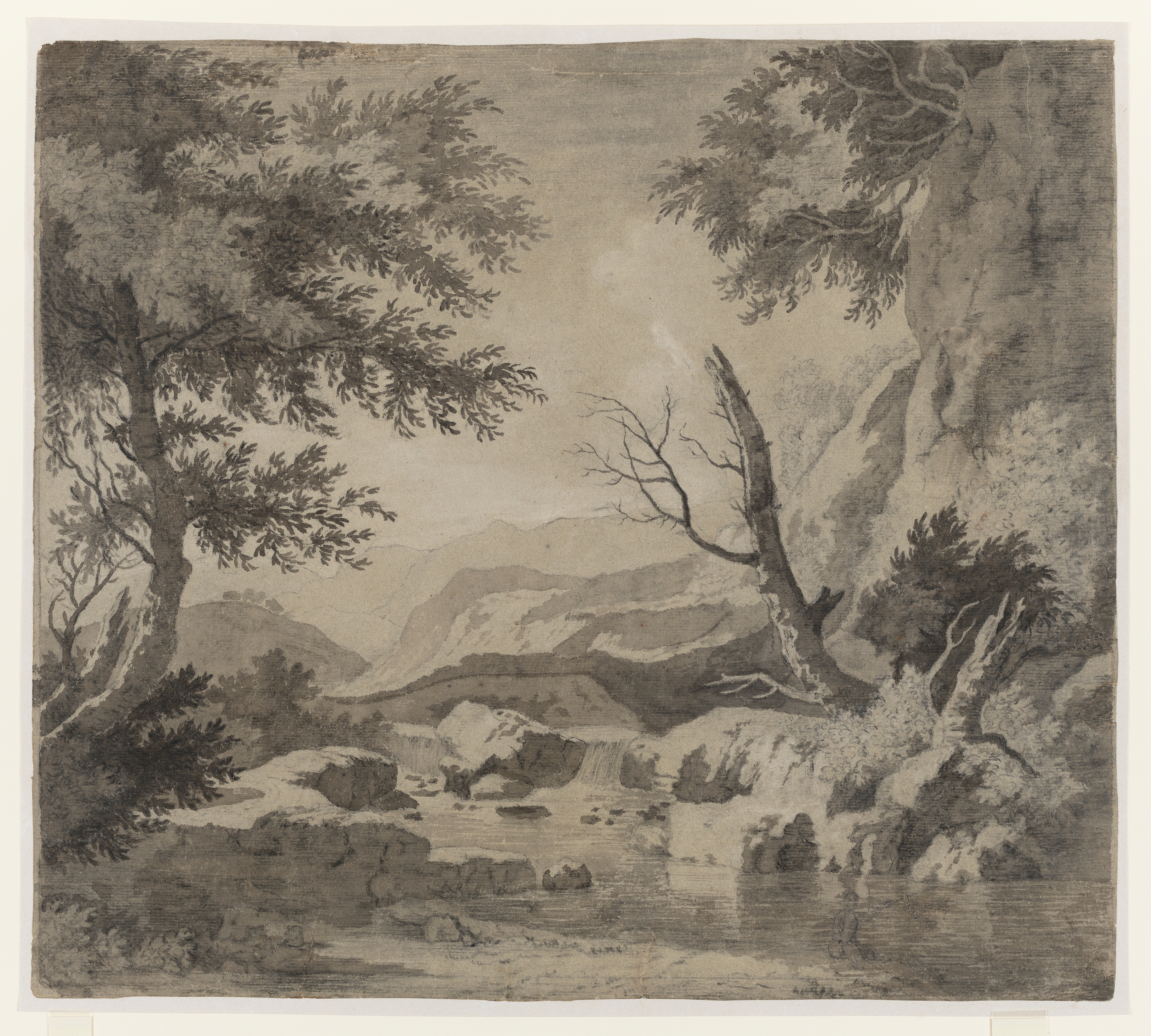 Drawing of a rocky landscape with a river. Traces of a figure fishing, sketched out in pencil, to bottom right. Made by Joseph Wright of Derby (1734-1797), date unknown. Ink wash over pencil on paper. Presented in a cream window mount.