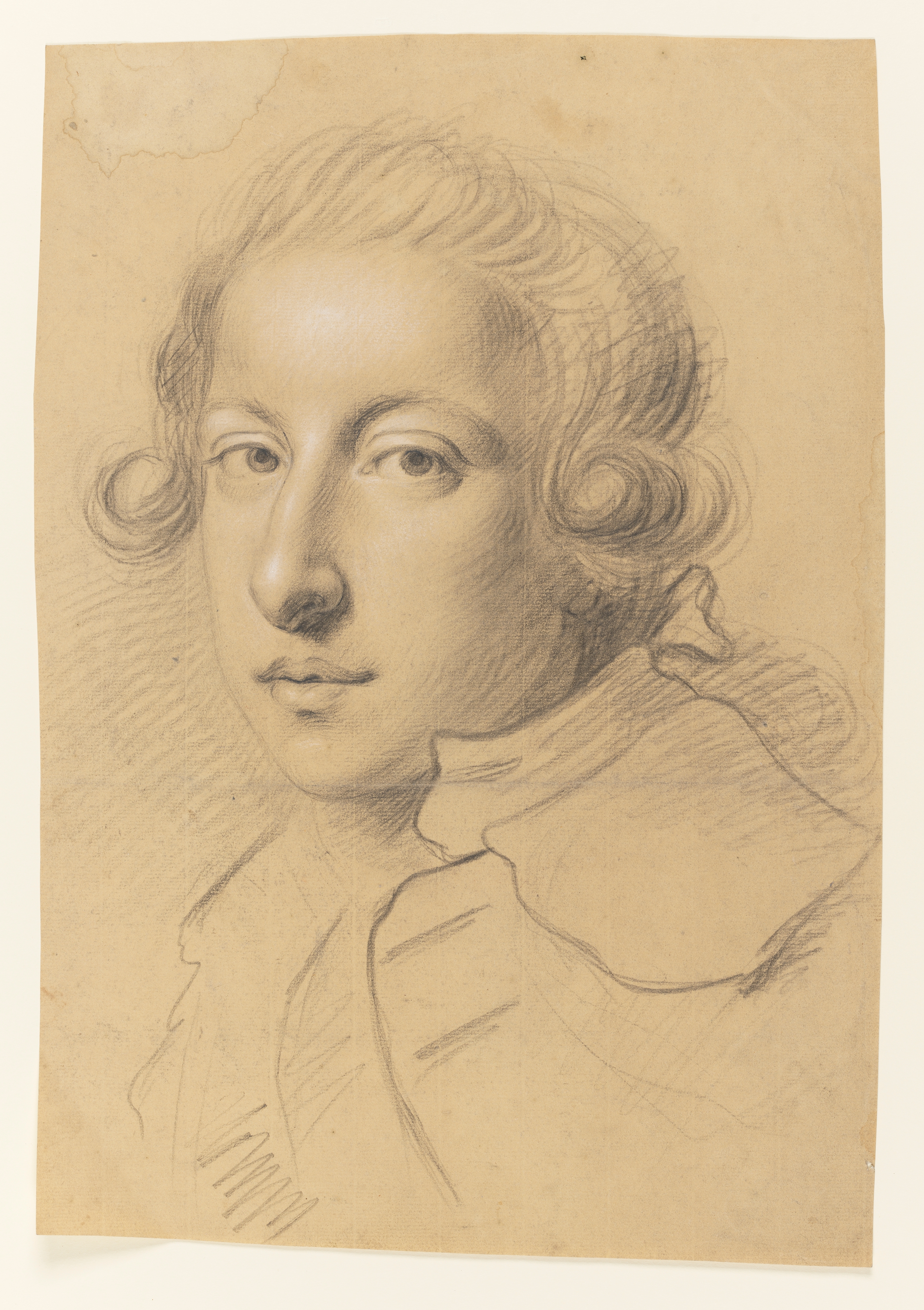 Study of a man, called Francis Burdett of Foremark; head and shoulders only, turned slightly to the left, his hair rolled and tied with a bow at the nape of his neck, wearing a coat with a cape and standing collar. Made by Joseph Wright of Derby (1734 - 1797). Black and white chalk on buff paper, in cream window mount.