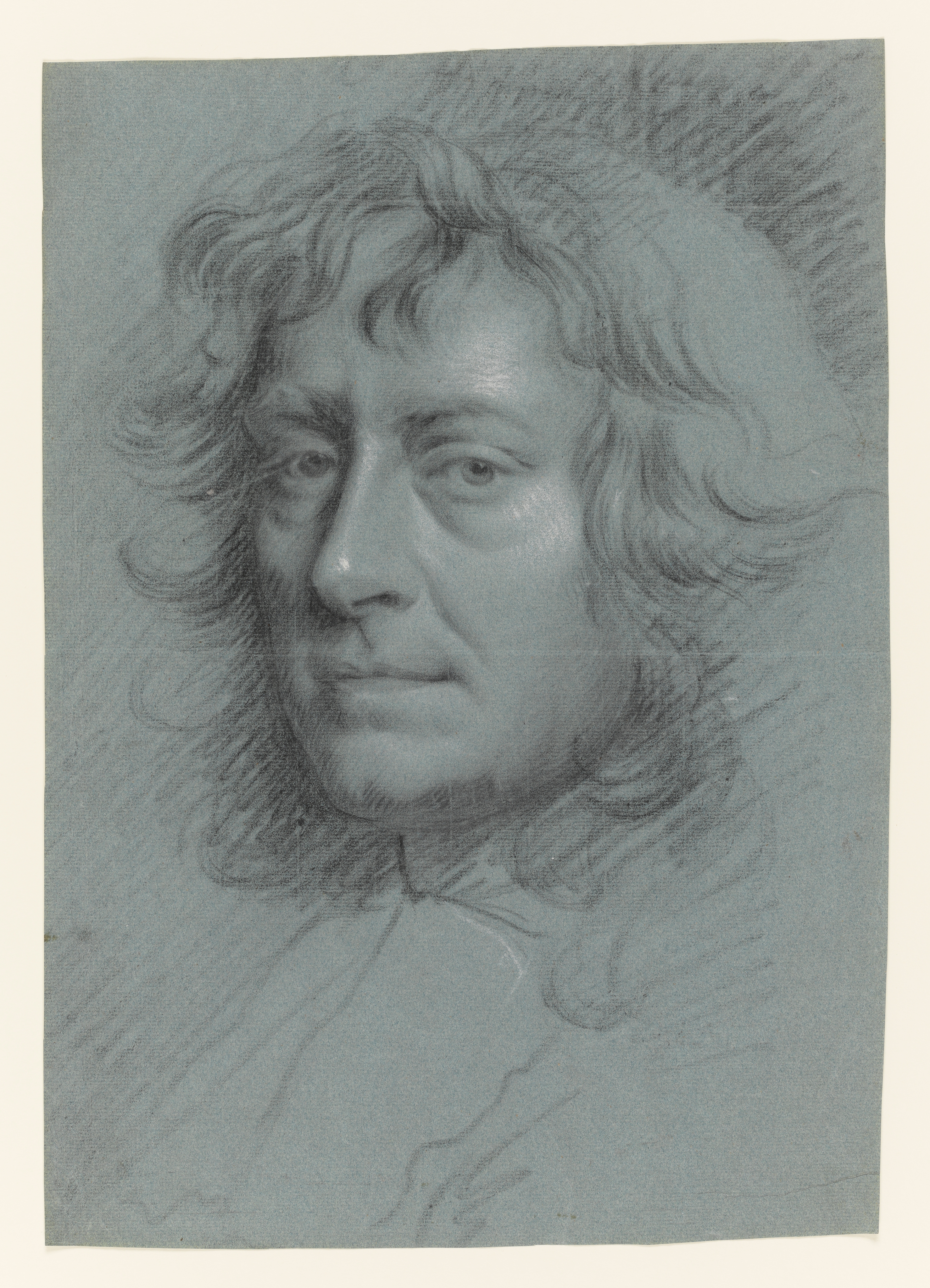 Study of a man, head only, facing to the left, looking at the viewer, with shoulder-length hair worn loose to the shoulder. Made by Joseph Wright of Derby (1734 - 1797). Black and white chalk on blue paper, in cream window mount.