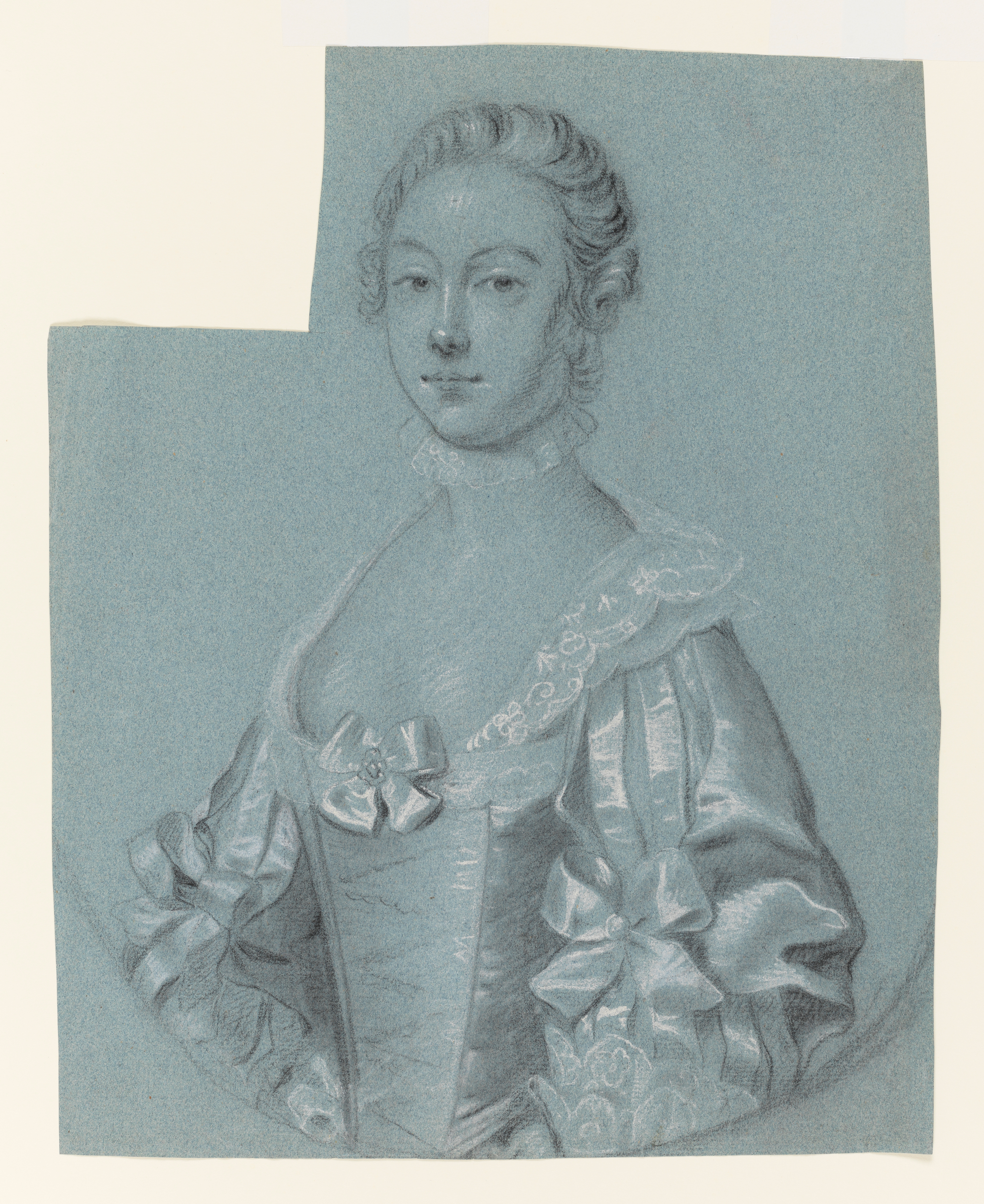 Study of a woman, called Mrs Allanson, after a portrait by Thomas Hudson; head and torso only, facing left, in a feigned oval, wearing Van Dyck dress. Her hair tied back, wearing a lace choker around her neck, her dress decorated with bows to her sleeves and bodice front, her sleeves slashed and a lace trim/collar to her bodice. A square cut out of the top left corner of the sheet. Made by Joseph Wright of Derby (1734 - 1797). Black and white chalk on blue paper, in cream window mount.