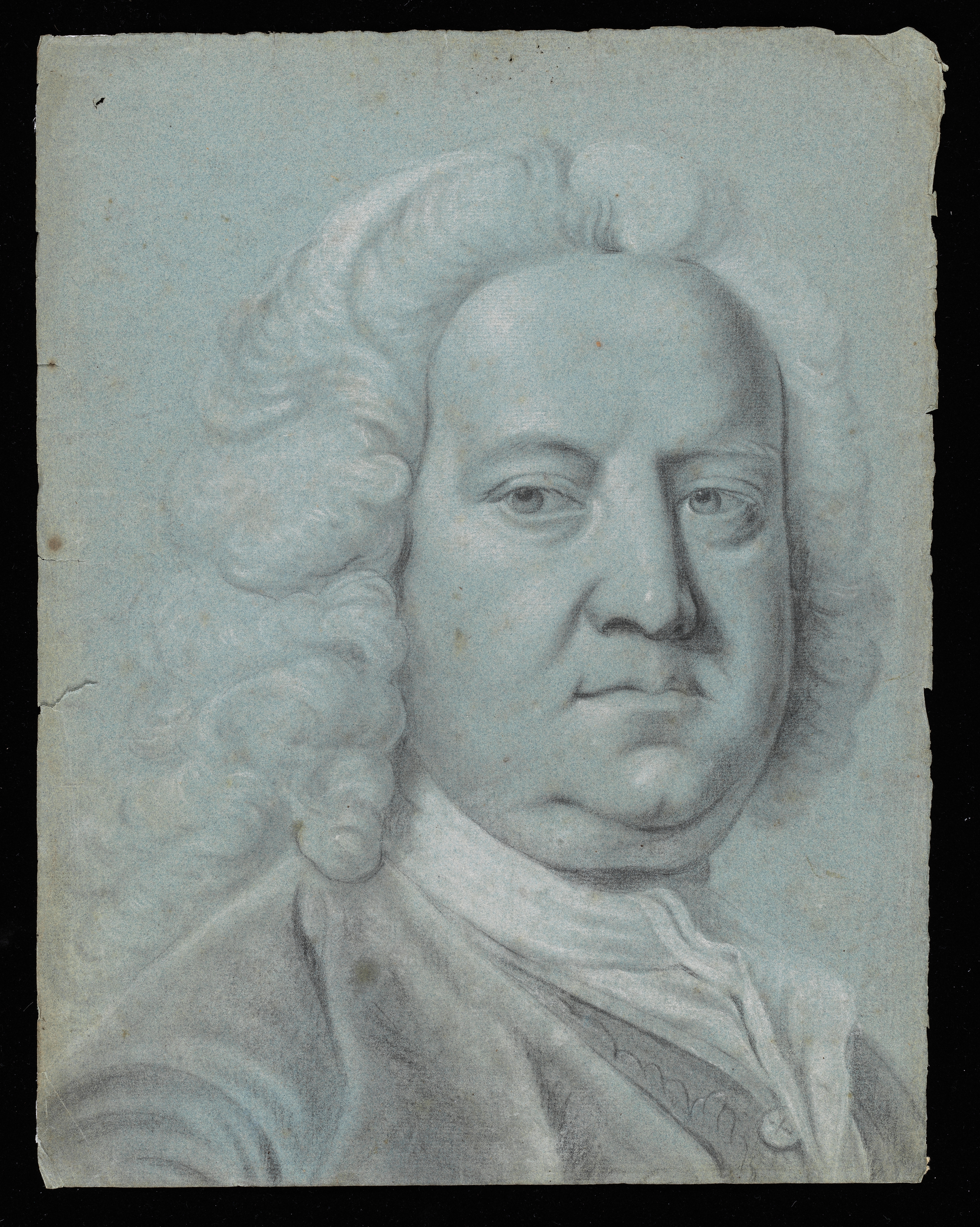 Portrait study of a man, head and shoulders only, facing slightly to the right. He wears a white neckcloth, decorated waistcoat, and coat. His hair (probably a wig) is curled and hangs loose. Made by Joseph Wright of Derby (1734 - 1797), 1751. Black and white chalk on blue paper, in cream window mount.
