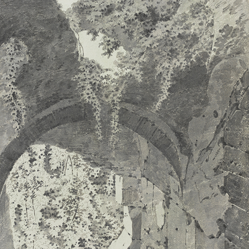 Drawing of architectural ruins, through an overgrown archway. Sunlight casts shadows where ivy cascades through and above the ruinous archway. Inscribed on recto, to top right (handwritten in pencil): '21'. Made by Joseph Wright of Derby (1734-1797), c.1774-1775. Pen and ink and grey wash over pencil on paper. Displayed in a cream window mount.